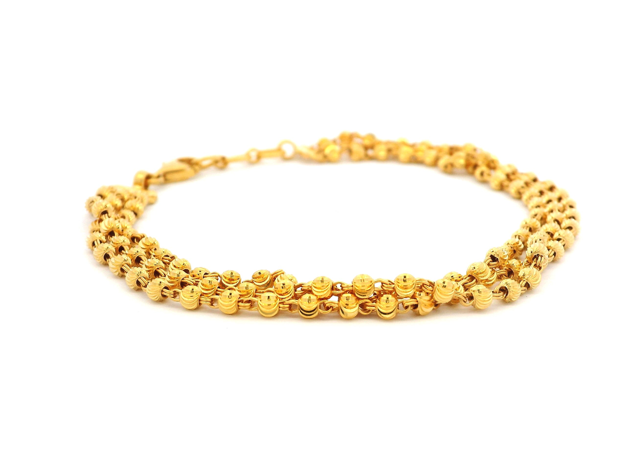 Elegant 22ct Yellow Gold Three-Row Bracelet with Diamond-Cut Bead Design