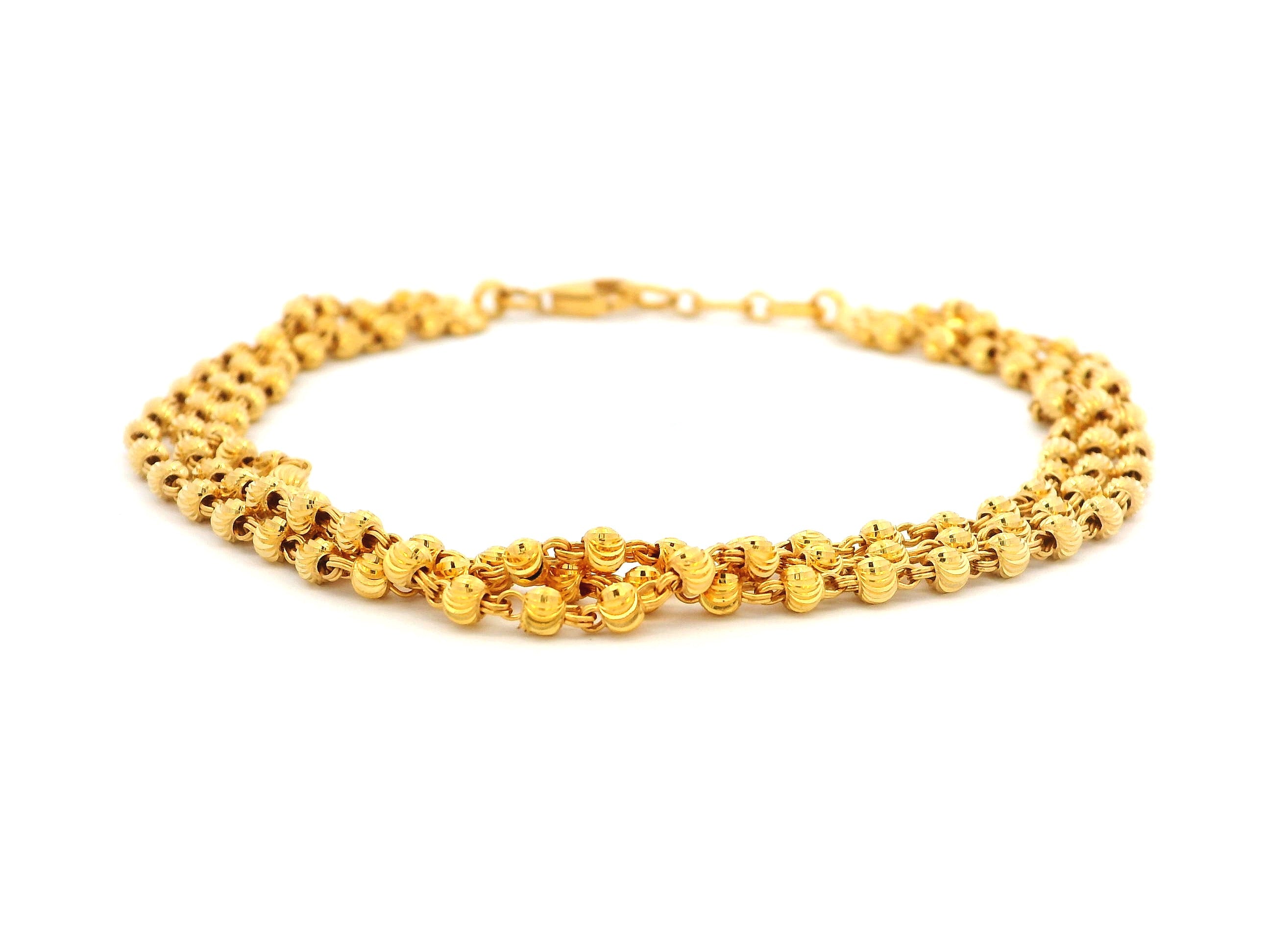 Elegant 22ct Yellow Gold Three-Row Bracelet with Diamond-Cut Bead Design